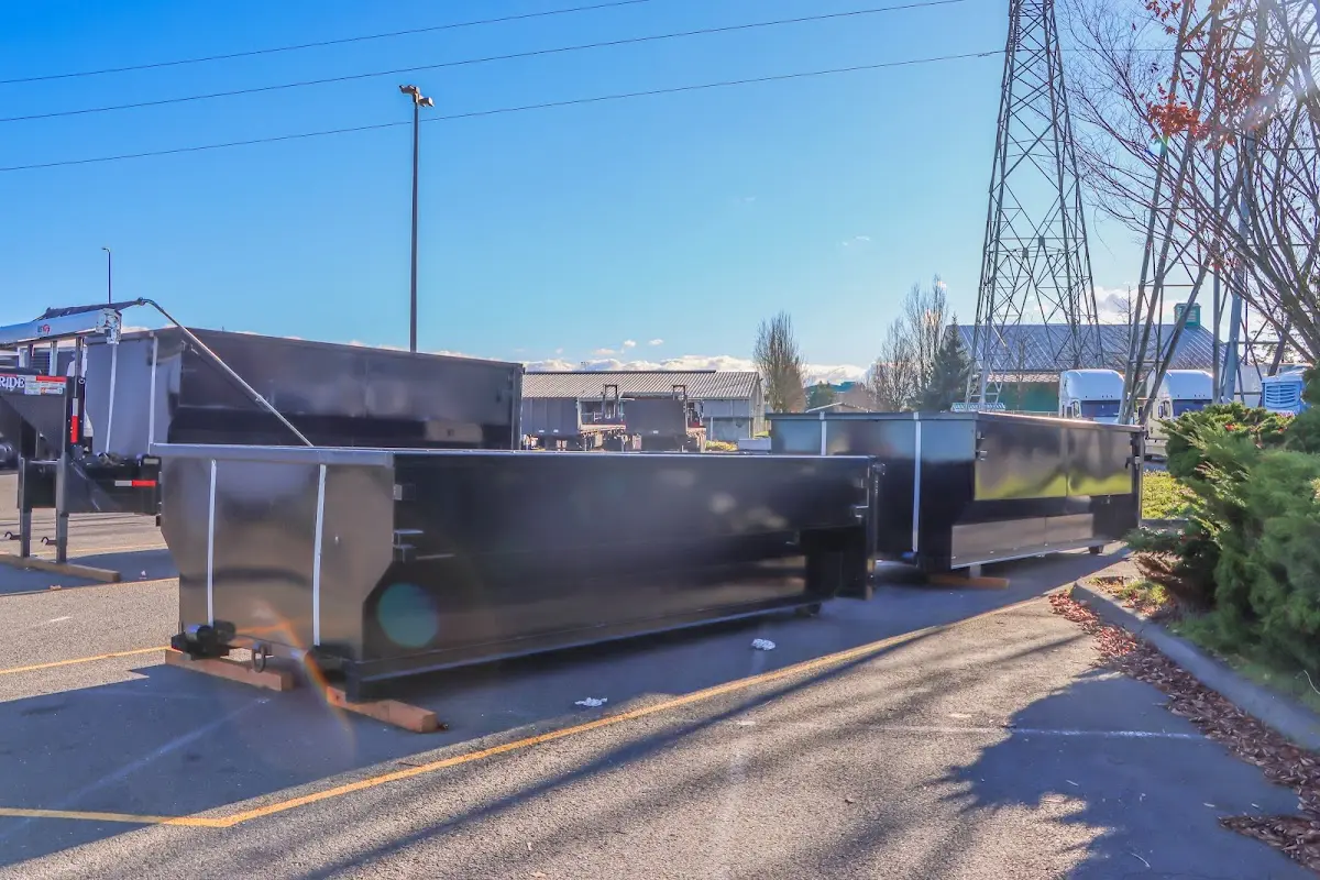 Roll-off dumpster ready for waste disposal at job site for Roll Off Dumpster Rental in Indianola